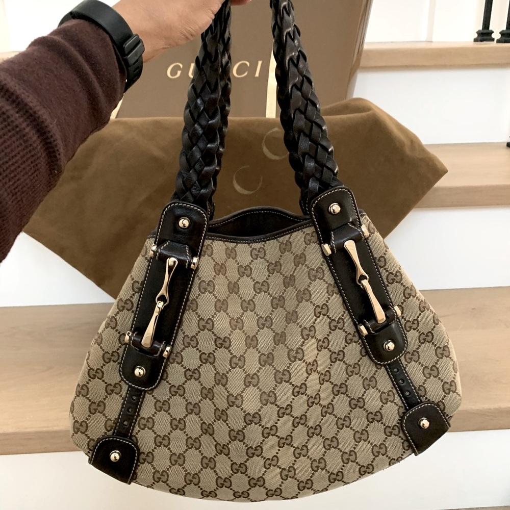 GUCCI Like New Pelham leather braided straps purse